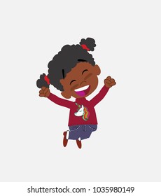 Black girl with a unicorn pullover jumping for joy.