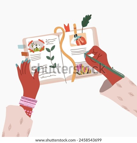 Black girl, woman, person writes in Album to collect memories of a trip to the sea, a journey.  Diary with notes, photos and pictures for memories of summer vacation, with dried plants.