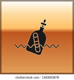 Black Glass bottle with a message in water icon isolated on gold background. Letter in the bottle. Pirates symbol.  Vector Illustration