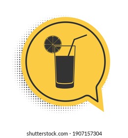 Black Glass of juice icon isolated on white background. Orange slice and tube for drinking. Healthy organic food. Yellow speech bubble symbol. Vector.