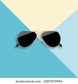 Black glasses in the form of droplet on blue background. Vector illustration.