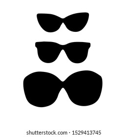 black glasses on a white background. black sunglasses. women's sunglasses from the sun. glasses for women. set