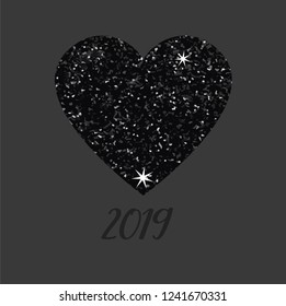 Black glitter heart on grey background. Happy christmas, 2019