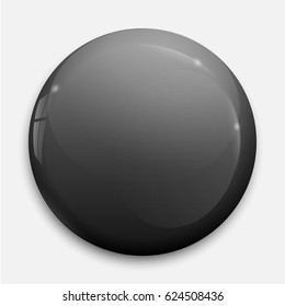 black glossy badge or button.