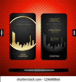 Black with gold business card on carbon background