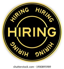 Black and gold color round sticker with word hiring on white background