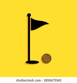 Black Golf ball and hole with flag icon isolated on yellow background. Golf course. Ball and flagstick in hole. Sport concept. Long shadow style. Vector.