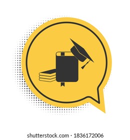 Black Graduation cap and book icon isolated on white background. Yellow speech bubble symbol. Vector.