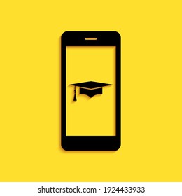 Black Graduation cap and smartphone icon. Online learning or e-learning concept icon isolated on yellow background. Long shadow style. Vector