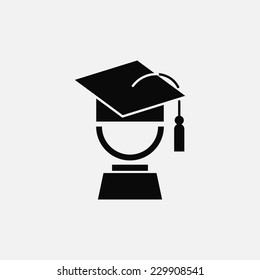 Black graduation symbol with a graduation cap, isolated.