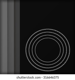 Black and gray background with shades and circles of letters