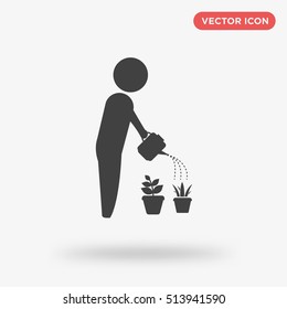 Black or gray gardener watering the flowers vector icon on white background