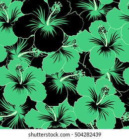 Black and green hibiscus flowers in a trendy vector style. Hawaiian tropical natural floral seamless pattern in black and green colors.
