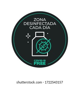 Black and green round sticker for disinfected areas of coronavirus. Covid-19 free. Disinfected area every day written in Spanish