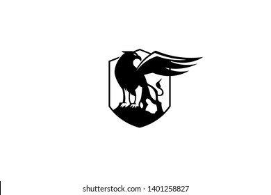 
the black griffin looks back. spread wings isolated logo in vector