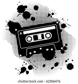 Black grunge audio cassette over white background