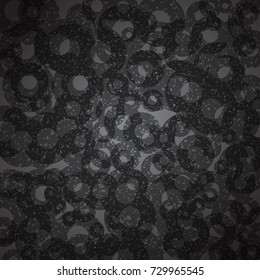 Black grunge background created from cracked circle. Vector.
