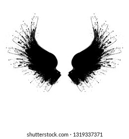 Black grunge bird wings silhouette with ink splash isolated on white background