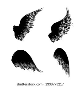 Black grunge bird wings silhouettes with ink splash isolated on white background