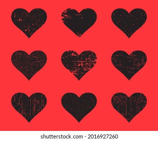 Black grunge hearts set. Distressed texture heart isolated on a red background. Vector illustration.