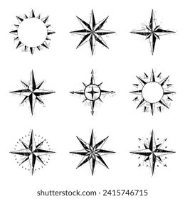 Black grunge ink blots compass silhouettes isolated on white