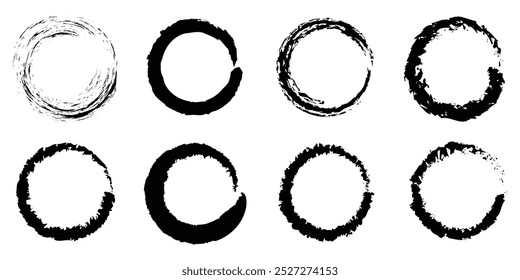 Black grunge round shapes isolated on a white background. Hand drawn circular brush strokes. Set of chalk circle shapes. Graffiti stamps. Distressed round shapes. Vector Illustration.