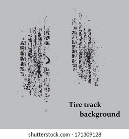Black grunge tire track on gray background. eps10