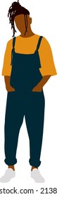 A black guy with black dreadlocks is standing in an orange t-shirt and blue overalls