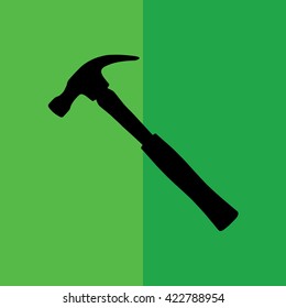 Black hammer icon vector illustration. Green background