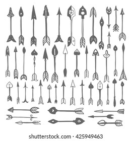 Black hand drawn doodle vector set of ethnic arrows on a white background