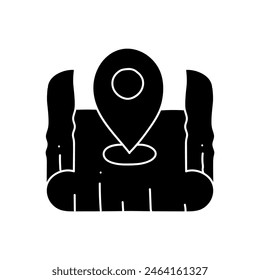 black hand drawn icon map pin on curled paper icon