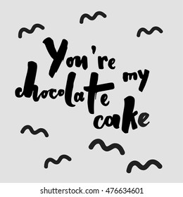 Black hand drawn quote on light background. Chocolate cake