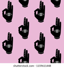 black hand with eye mudra on a pink background buddhism hinduism symbol pattern seamless yoga India meditation zen hipster vector.