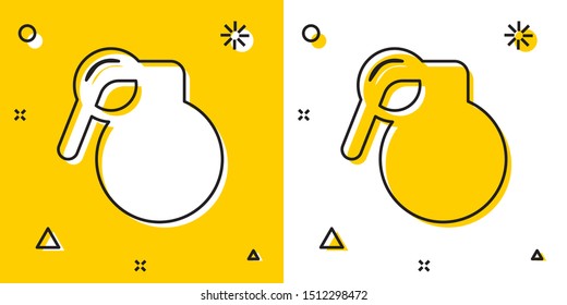 Black Hand grenade icon isolated on yellow and white background. Bomb explosion. Random dynamic shapes. Vector Illustration