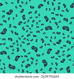 Black Hand holding casino chips icon isolated seamless pattern on green background. Casino gambling.  Vector