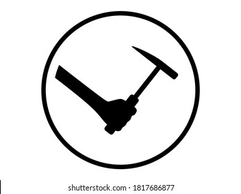 Black hand holding geologic rock pick hammer.  