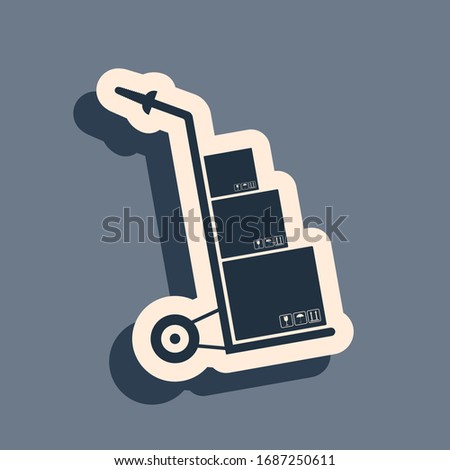 Black Hand truck and boxes icon isolated on grey background. Dolly symbol. Long shadow style. Vector Illustration