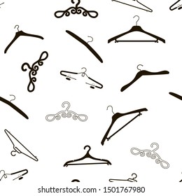 Black hangers with light background