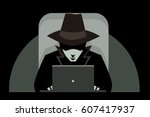 black hat hacker using a computer 