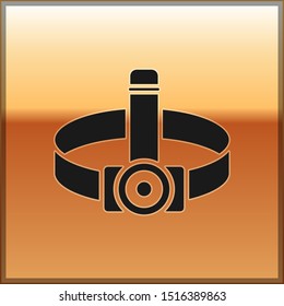 Black Head flashlight icon isolated on gold background. Tourist head flashlight. Camping head light.  Vector Illustration