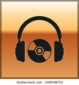 Black Headphones and CD or DVD icon isolated on gold background. Earphone sign. Compact disk symbol. Vector Illustration