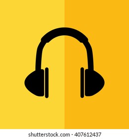 Black headphones icon vector illustration. Yellow background