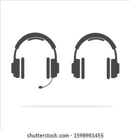 Black headphones and microphone in flat style. Vector illustration.