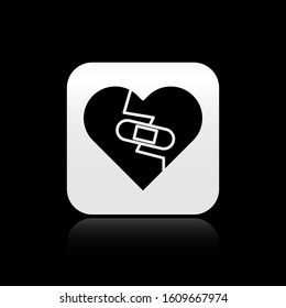 Black Healed broken heart or divorce icon isolated on black background. Shattered and patched heart. Love symbol. Valentines day. Silver square button. Vector Illustration