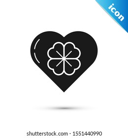 Black Heart with four leaf clover icon isolated on white background. Happy Saint Patrick day.  Vector Illustration