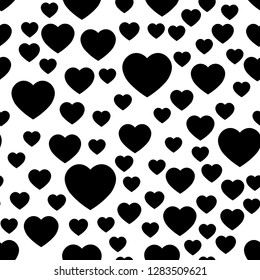 Black heart silhouettes seamless pattern. Random scattered hearts background. Love or Valentine theme. Vector illustration.