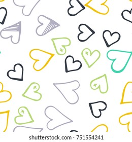 Black hearts seamless pattern. Scattered little gray, yellow, green love symbols. Endlessly repeating falling sketch heart shape on white valentine background. Hand draw texture. Vector illustration.