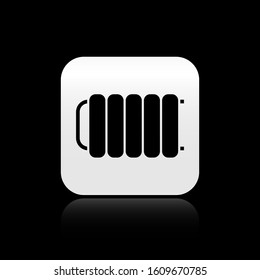Black Heating radiator icon isolated on black background. Silver square button. Vector Illustration