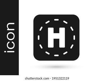 Black Helicopter landing pad icon isolated on white background. Helipad, area, platform, H letter.  Vector