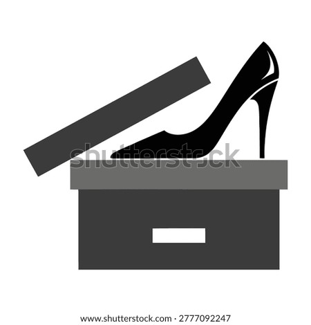 Black high heel shoe emerging from an open shoe box on white background, elegant fashion accessory